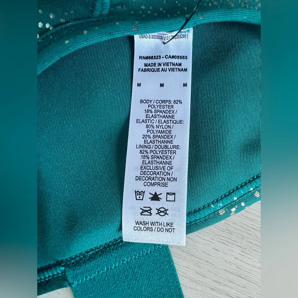 Nike Swoosh women’s sports bra. Asymmetrical, non-padded. Sz medium. - Picture 5 of 5